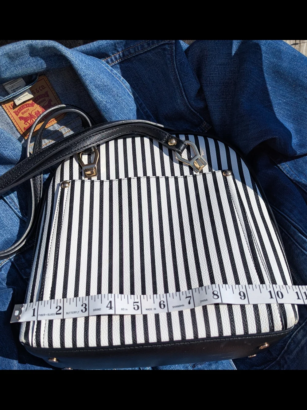 Mystique Boutique Black and White Striped Backpack